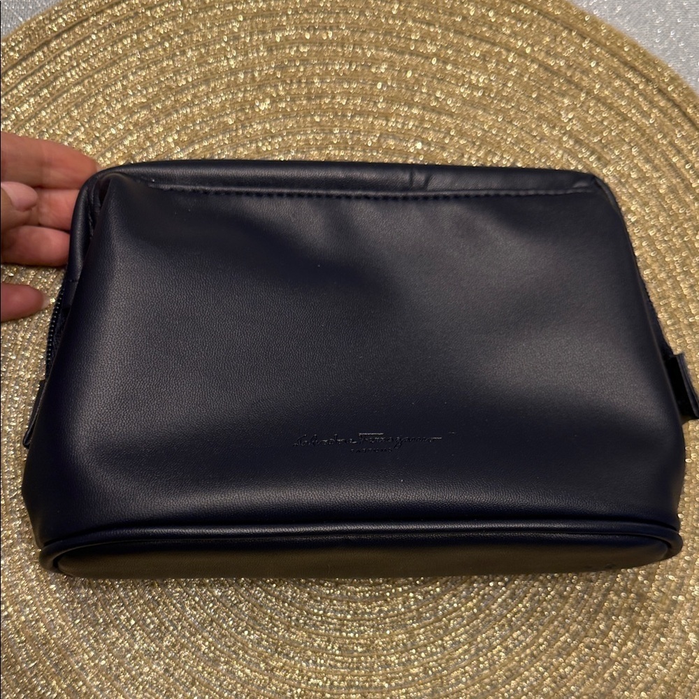 Salvatore Ferragamo small travel Bag size 5.5*8”